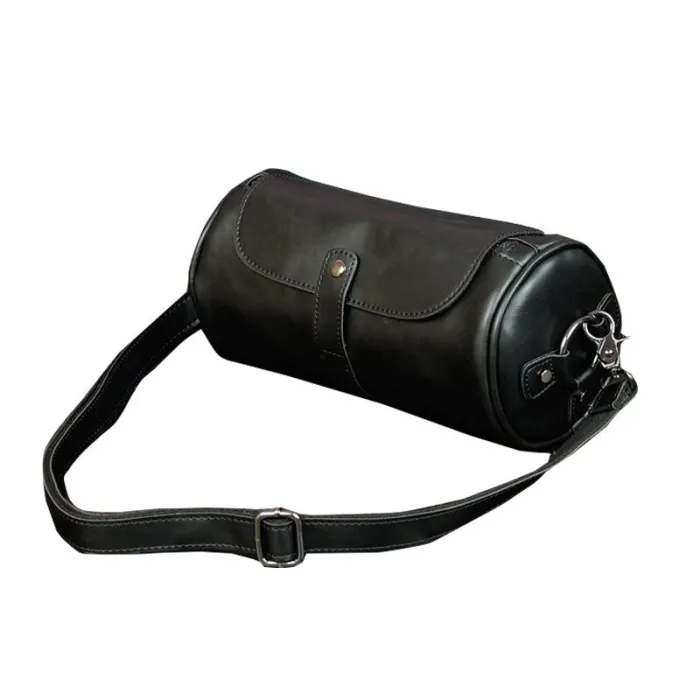 Trendy skuldertaske i læder - cylindrisk form