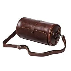 Trendy skulderveske i skinn - sylindrisk form