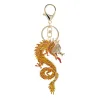 Nøkkelring med en gul krystalldrage