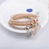 Elegant tredelt armbånd - med krystallhjerter - sølv - gull - rosa gull