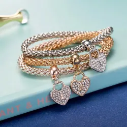 Elegant tredelt armbånd - med krystalhjerter - sølv - guld - rosaguld