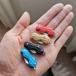 Mini fickkniv - hopfällbar - rostfritt stål - jordnötsform