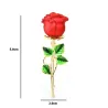 Klassisk sølje med rød rose