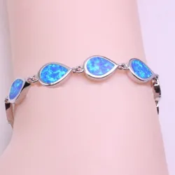 Fasjonabelt armbånd - med vanndråpeformet blå opal