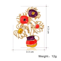 Elegant gylden broche - med farverige solsikker