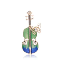 BrochesElegante broche con guitarra y mariposa de cristal.