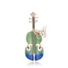 Snygg brosch med gitarr & kristallfjäril