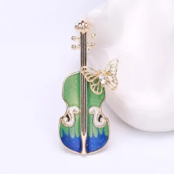 Snygg brosch med gitarr & kristallfjäril