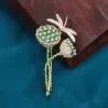 Lotusblomst med krystal guldsmede - elegant broche