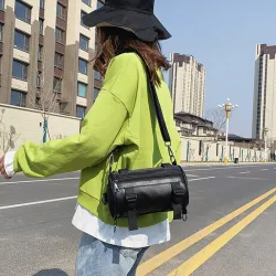 Moderigtig lille crossbody-taske - cylinderformet - unisex