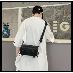 Fasjonabel liten crossbody-veske - sylinderformet - unisex