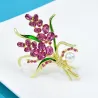 Luksuriøs broche - lyserøde krystalblomster