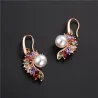 Boucles d'oreilles élégantes en or - perle - zircone cubique colorée