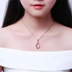 Collier élégant en or rose - pendentif en forme de goutte d'eau - cristaux - opale rose