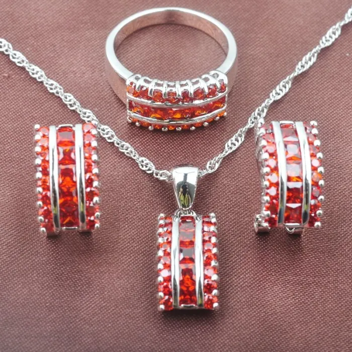 Ensemble de bijoux élégant - avec zircone rouge - collier - boucles d'oreilles - bague