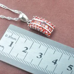 Ensemble de bijoux élégant - avec zircone rouge - collier - boucles d'oreilles - bague