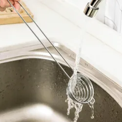 Séparateur de blancs d'œufs - cuillère inox spirale - manche long