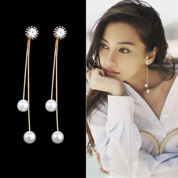 Eleganti orecchini lunghi con perle / cristallo