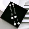 AretesPendientes largos elegantes con perlas / cristal
