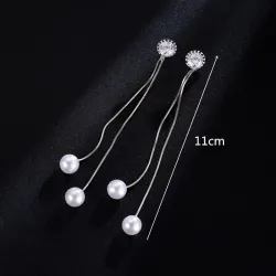 AretesPendientes largos elegantes con perlas / cristal