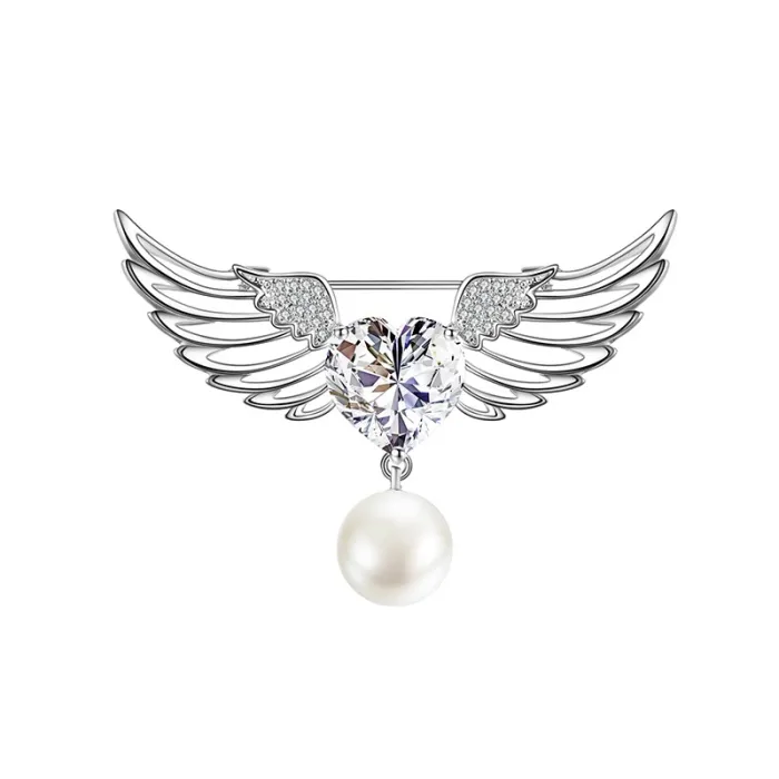 Luksuriøs brosje - englevinger - krystallhjerte - perle