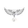 Luksuriøs broche - englevinger - krystalhjerte - perle