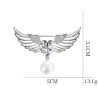 Luksuriøs broche - englevinger - krystalhjerte - perle