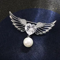 BrochesBroche de lujo - alas de ángel - corazón de cristal - perla