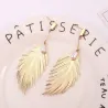 Boucles d'oreilles plumes feuilles - avec une perle