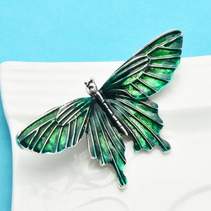 Broche papillon en émail