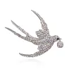 Farverig rhinstensfugl - vintage broche