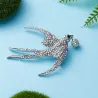 Farverig rhinstensfugl - vintage broche
