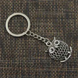 Vintage silver keychain - branch standing owlKeyrings
