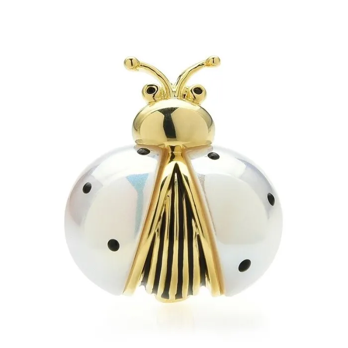 Broche coccinelle blanche / dorée