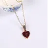 CollarColgante en forma de corazón rojo con cruz - con collar
