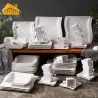 Elegant servis - middagsset i vitt porslin - koppar - fat - tallrikar