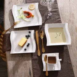 Elegant servis - middagsset i vitt porslin - koppar - fat - tallrikar