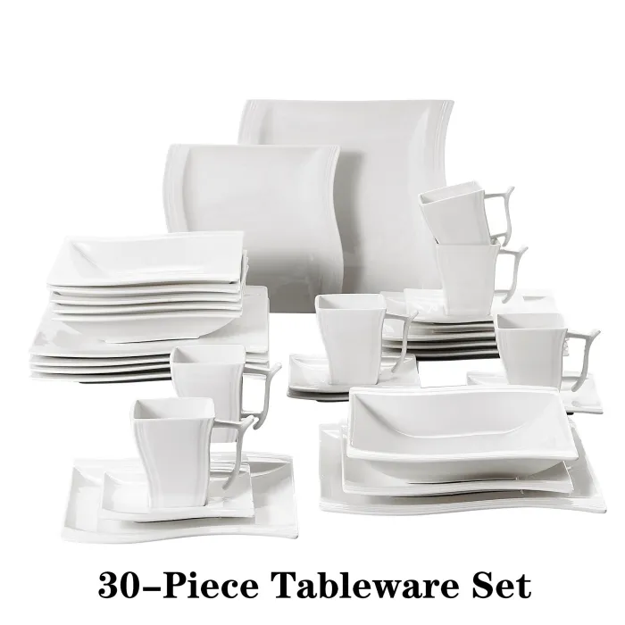 Elegant servis - middagsset i vitt porslin - koppar - fat - tallrikar