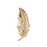Broche plume dorée - avec cristaux