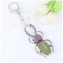 chaveiro em forma de inseto de cristal