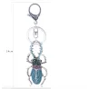 chaveiro em forma de inseto de cristal