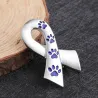 Broche en forme de ruban - empreinte de patte d'animal