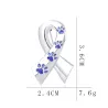 Broche en forme de ruban - empreinte de patte d'animal
