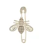 Abeille en or brillant - broche en cristal