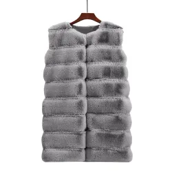 Elegant ermeløs kåpe - pelsvest