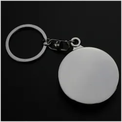 Spinning Russian roulette - rotatable round keychainKeyrings