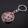 Spinning Russian roulette - rotatable round keychainKeyrings