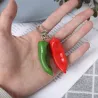 Dobbel rød / grønn chilipepper - nøkkelring