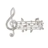 Spilla con note musicali in cristallo