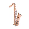Saxophone cristal doré - broche